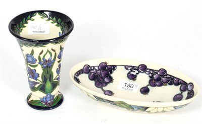 Lot 190 - A modern Moorcroft pottery Kaffir Lily pattern 86/6 vase, designed by Shirley Hayes, two star...