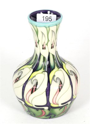 Lot 195 - A modern Moorcroft pottery Lily Come Home pattern vase, designed by Emma Bossons, signed and...