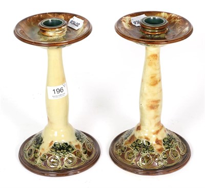 Lot 196 - A pair of Doulton Art Nouveau candlesticks, relief moulded, foliate scrollwork, damaged, 23cm...