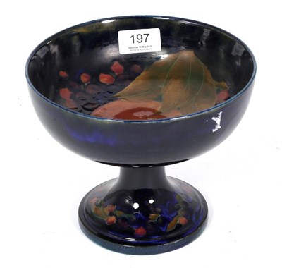 Lot 197 - William Moorcroft Pomegranate pedestal bowl on a blue ground