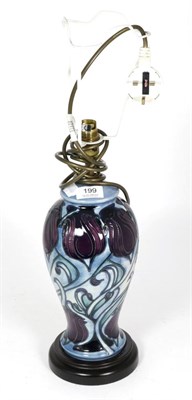 Lot 199 - A modern Moorcroft pottery Black Tulip pattern table lamp, 30cm high (excluding fitting)
