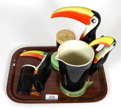 Lot 225 - A Carlton Ware Guinness Toucan lamp base; with a similar mug and a wall plaque copy (3)