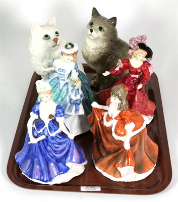 Lot 232 - Four Royal Doulton figures and two Beswick cats