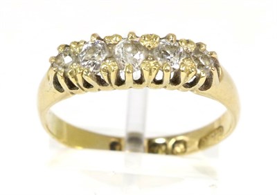 Lot 241 - A Victorian 18 carat gold five stone diamond ring, graduated old cut diamonds in claw settings,...