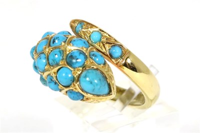 Lot 247 - An 18 carat gold turquoise snake ring, inset with round and pear cabochon turquoise, to a snake...