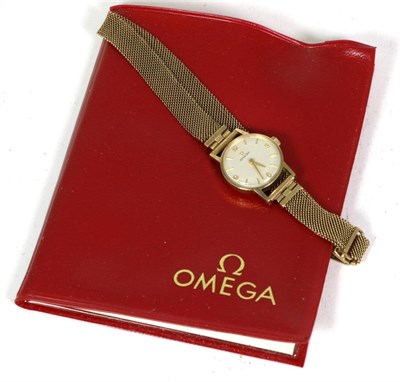 Lot 272 - A ladies 9ct gold wristwatch, signed Omega, case back with an engraved inscription, later 9ct...