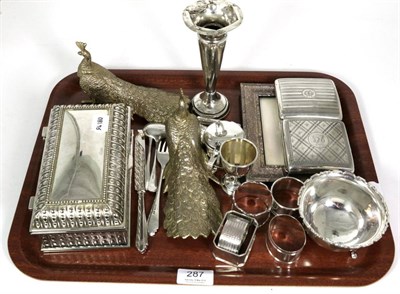 Lot 287 - A group of silver items to include; two cigarette cases; a vesta case; five napkin rings;...