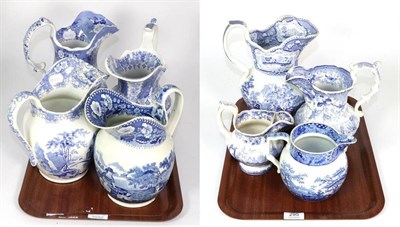 Lot 295 - A group of eight 19th Century blue and white transfer printed jugs, including one ";Andalusia"; and