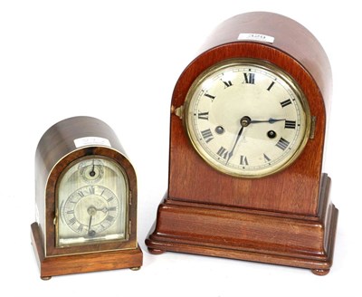 Lot 329 - A mantle clock in arched case together with another smaller example marked Sorley, Glasgow (2)