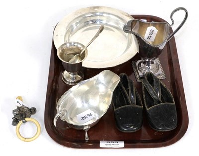 Lot 353 - A group of silver items, comprising: a shallow bowl Atkin Bros, Sheffield 1918; a sauceboat,...