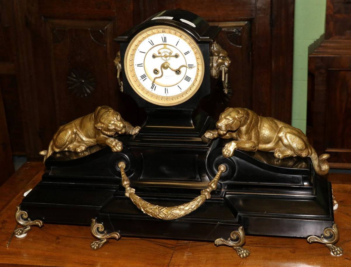 Lot 357 - A slate mantel clock