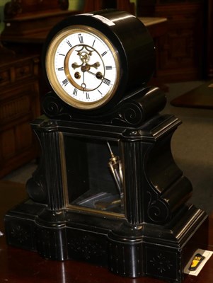 Lot 362 - A Victorian black slate striking mantel clock, dial with a visible Brocot escapement