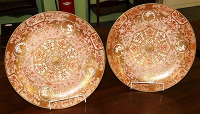 Lot 364 - A pair of Kutani chargers, in typical red and gold palette, signed, 36.5cm diameter (2)