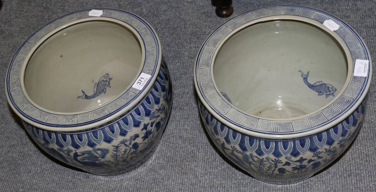 Lot 371 - A pair of 20th century Chinese blue and white fish bowl jardinieres