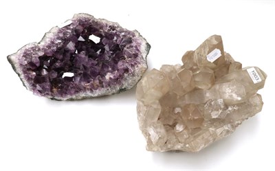Lot 1003 - Minerals: Two Large Mineral Specimens; comprising an Amethyst geode, 34cm wide; together with a...