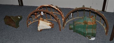 Lot 1152 - Three cast iron rain water hoppers; and hay racks (6)