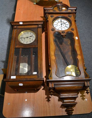 Lot 1153 - A walnut veneered Vienna type wall clock and an Art Deco striking wall clock (2)