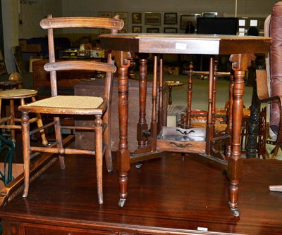 Lot 1196 - An Edwardian mahogany occasional table and a chair (2)