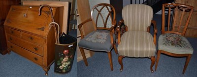 Lot 1198 - An oak bureau; three chairs; a pine two tier wall rack; a floral decorated stick stand...