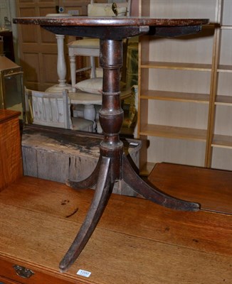 Lot 1201 - A 19th century mahogany tripod table