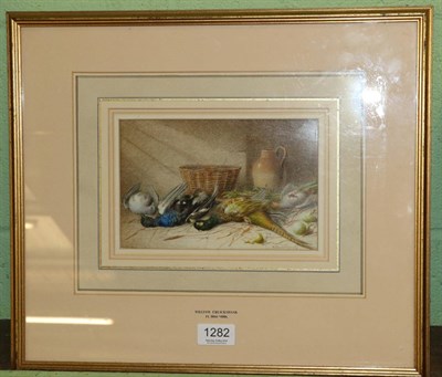 Lot 1282 - William Cruickshank (1848-1922), Dead pheasants before a terracotta jug and rattan basket...