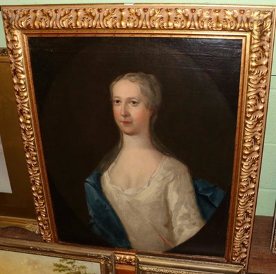 Lot 1293 - Manner of Sir Godfrey Kneller, Portrait of a Lady, half length wearing a white satin dress with...