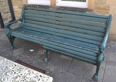 Lot 1314 - A large green painted garden bench