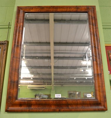 Lot 1316 - A 19th century walnut veneered wall mirror