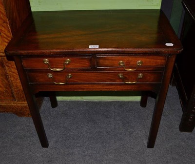 Lot 1323 - A 19th century mahogany side table fitted with two short drawers over one long drawer