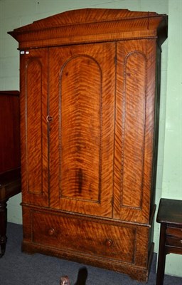 Lot 1325 - A Victorian scumbled pine single door wardrobe, circa 1870, with an architectural pediment above an