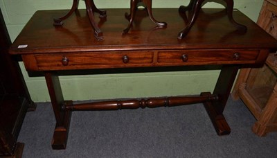 Lot 1331 - A two drawer writing table, circa 1840