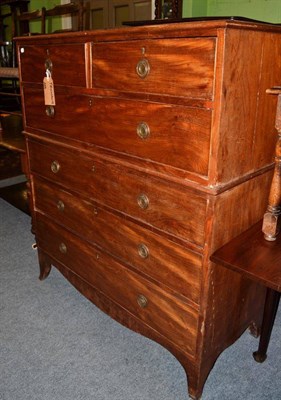 Lot 1341 - A George III mahogany chest on chest, early 19th century, the upper section with two short over one