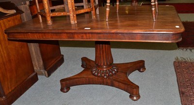 Lot 1342 - A William IV rectangular mahogany breakfast table, with fluted support, on quatrefoil base