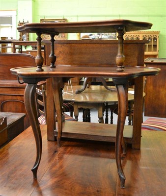 Lot 1354 - A French rosewood two tier table