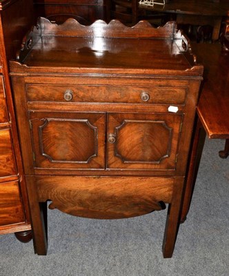 Lot 1355 - A mahogany commode