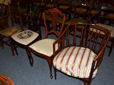 Lot 1368 - A cane seat spindle back tub chair together with three further single chairs