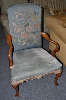 Lot 1377 - An 18th century upholstered walnut open armchair on cabriole supports