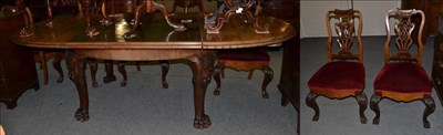 Lot 1387 - A Late 19th century continental walnut oval extending dining table, with moulded edge above...