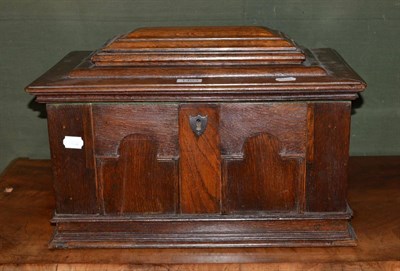 Lot 1403 - An unusual oak box with hinged top, fitted with a quantity of secret compartments