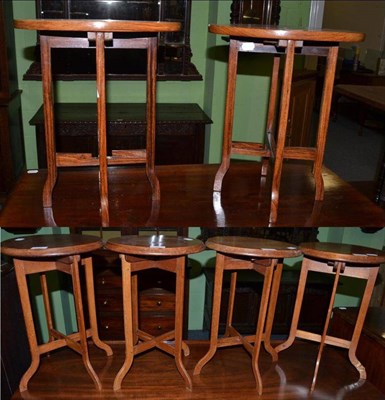 Lot 1408 - A pair of Indian inlaid folding occasional tables and a set of four folding tables