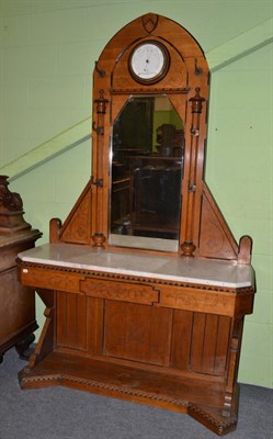 Lot 1422 - A late Victorian oak mirror backed hall stand with combined aneroid barometer