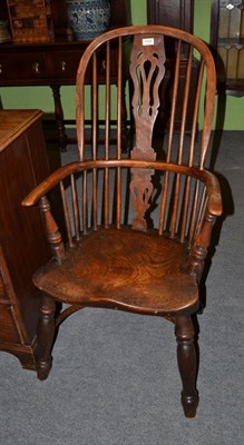 Lot 1430 - A country Windsor armchair with crinoline stretcher