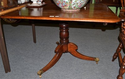 Lot 1433 - A 19th century mahogany tilt top pedestal breakfast table