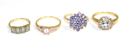Lot 133 - A 9 carat gold tanzanite cluster ring, marquise cut tanzanite in claw settings, finger size R;...
