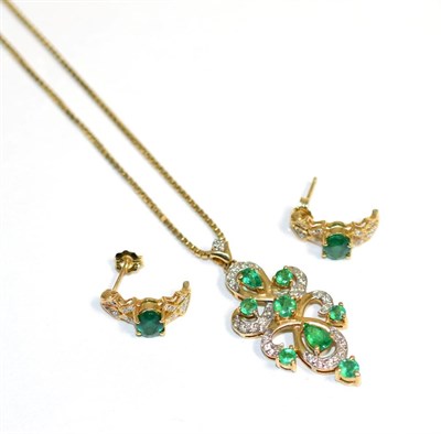 Lot 136 - An emerald and diamond pendant, round and pear cut emeralds in claw settings, to a pavé set...