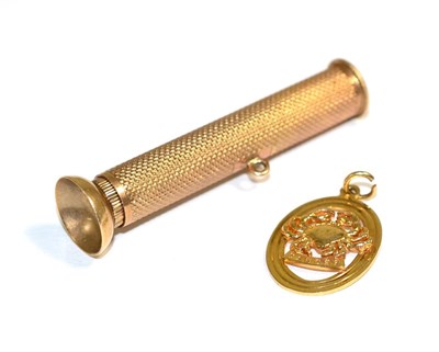 Lot 150 - A 9 carat gold cased cigar piercer, 5cm in length; and a 9 carat gold cancer zodiac pendant,...