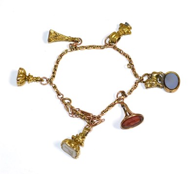 Lot 151 - A belcher chain bracelet, suspending five hardstone set fob seals, including a lion topped...