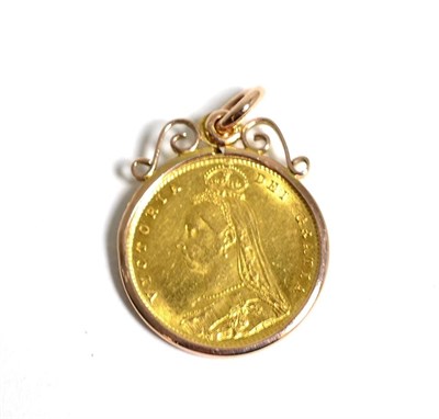 Lot 167 - Victorian 1887 half sovereign, loose mount in a frame as a pendant