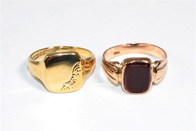 Lot 170 - A 9 carat gold signet ring, finger size Q1/2 and a carnelian set signet ring, finger size T,...