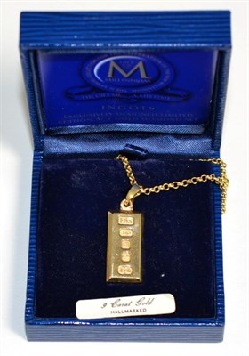 Lot 183 - A 9 carat gold 1/4oz ingot pendant, on a 9 carat gold belcher chain, length 61cm